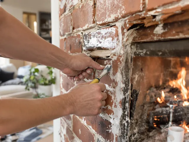Routine fireplace repair by Smithfield Chimney Sweep in Smithfield, RI